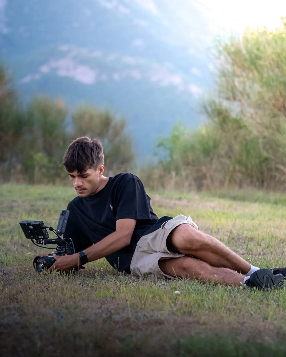 Lorenzo Saini filming on the shores of Lake Como